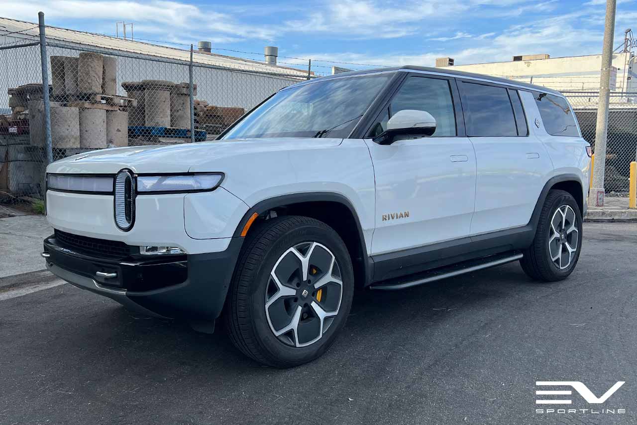 Glacier White Rivian R1T with Triple Square Running Boards
