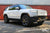 Glacier White Rivian R1S with Triple Slot Running Boards