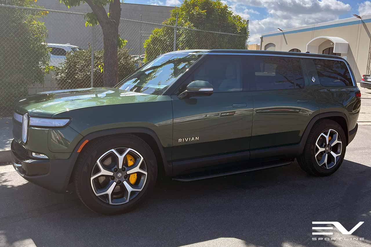 Forest Green Rivian R1S with Triple Square Running Boards