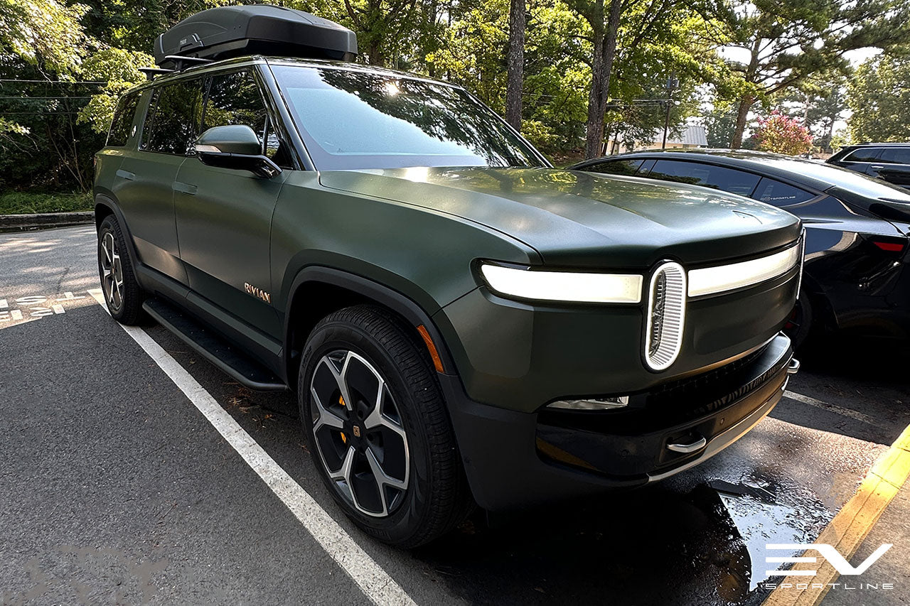 Launch Green Rivian R1S with Triple Square Running Boards