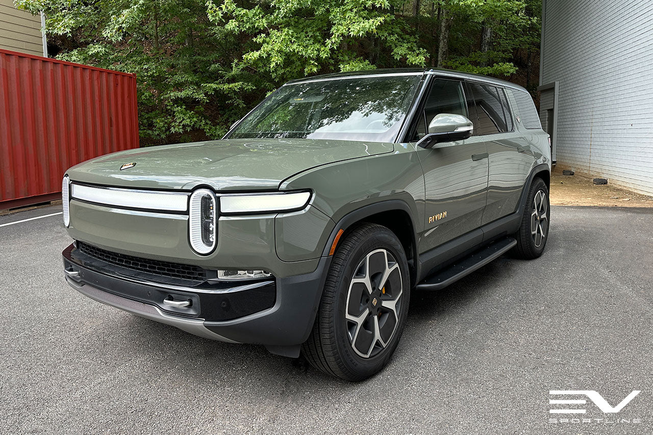 Launch Green Rivian R1S with Triple Square Running Boards