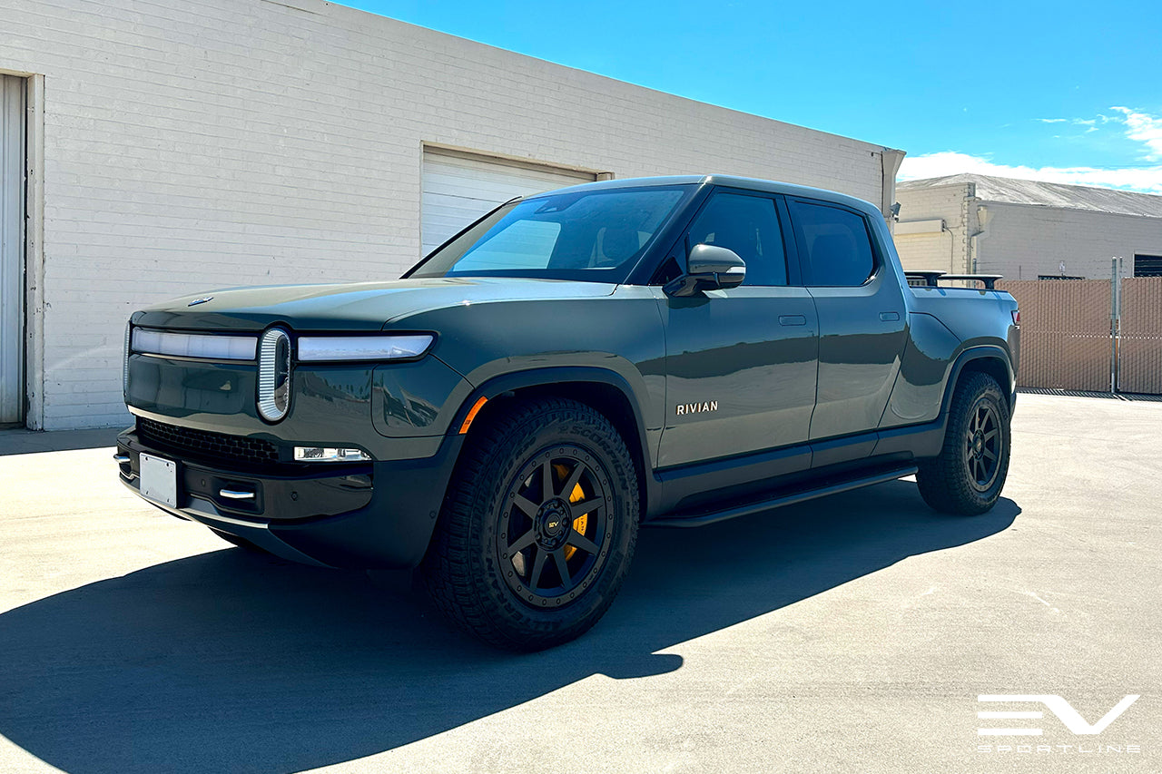 Launch Green Rivian R1T with Triple Square Rock Sliders