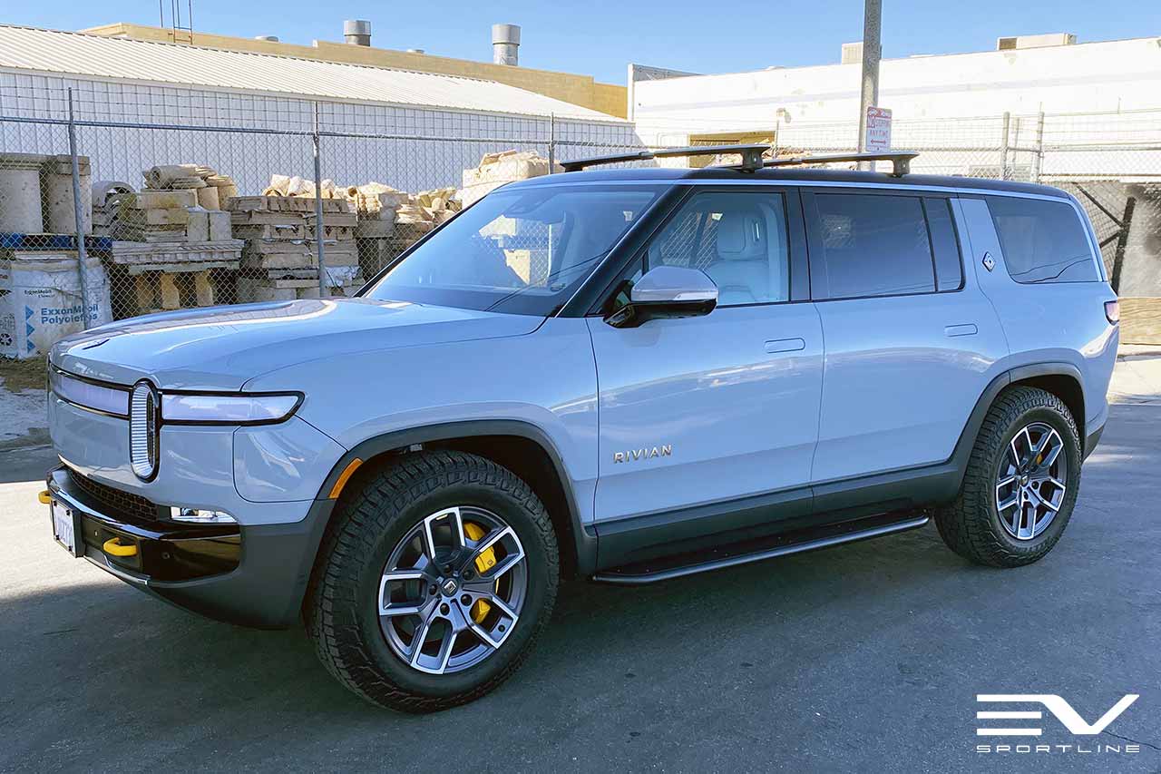 Glacier White Rivian R1S with Triple Square Running Boards