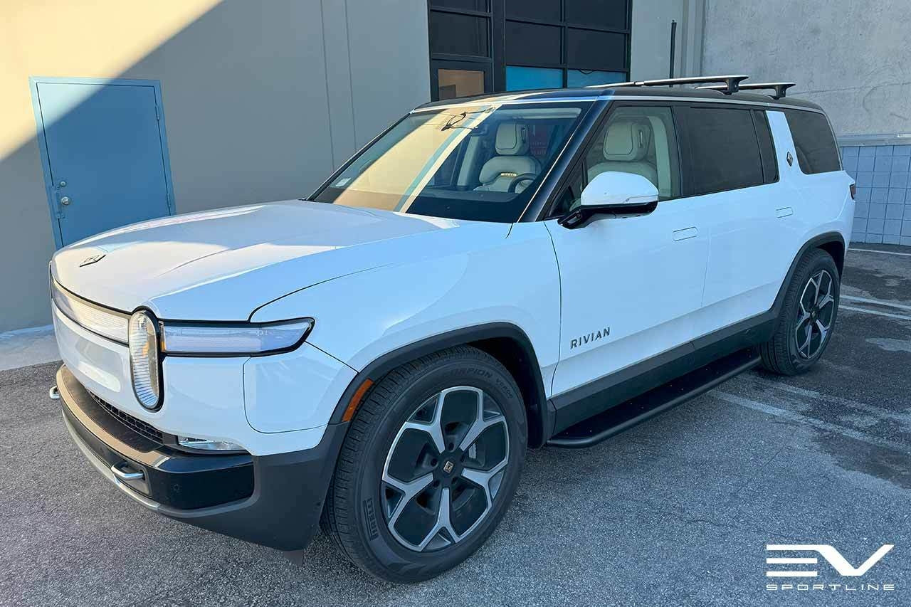 Glacier White Rivian R1S with Triple Square Running Boards