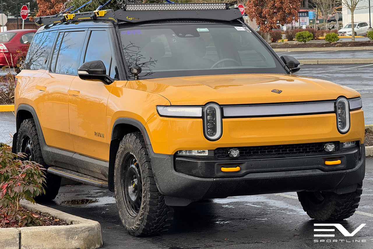 Compass Yellow Rivian R1S with R1600 Steel Wheels