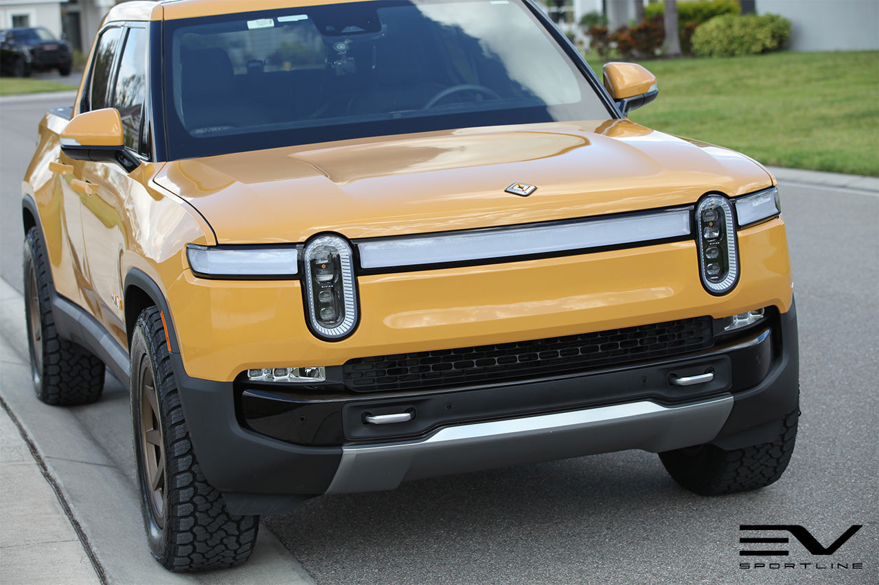 Compass Yellow Rivian R1T with Adventure Bronze 20