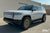 Glacier White Rivian R1S with Triple Slot Running Boards