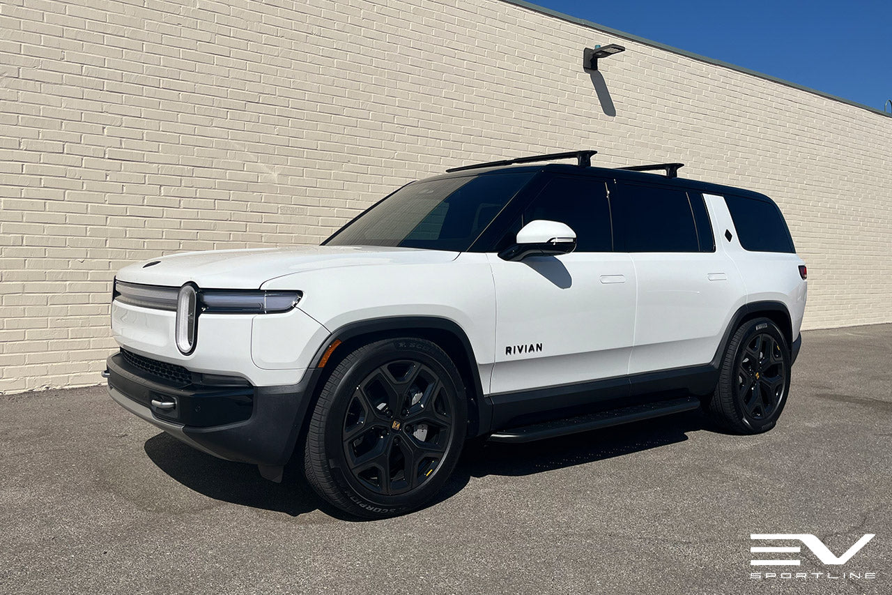 Glacier White Rivian R1S with Triple Square Running Boards