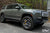Launch Green Rivian R1S with Triple Slot Thread Running Boards
