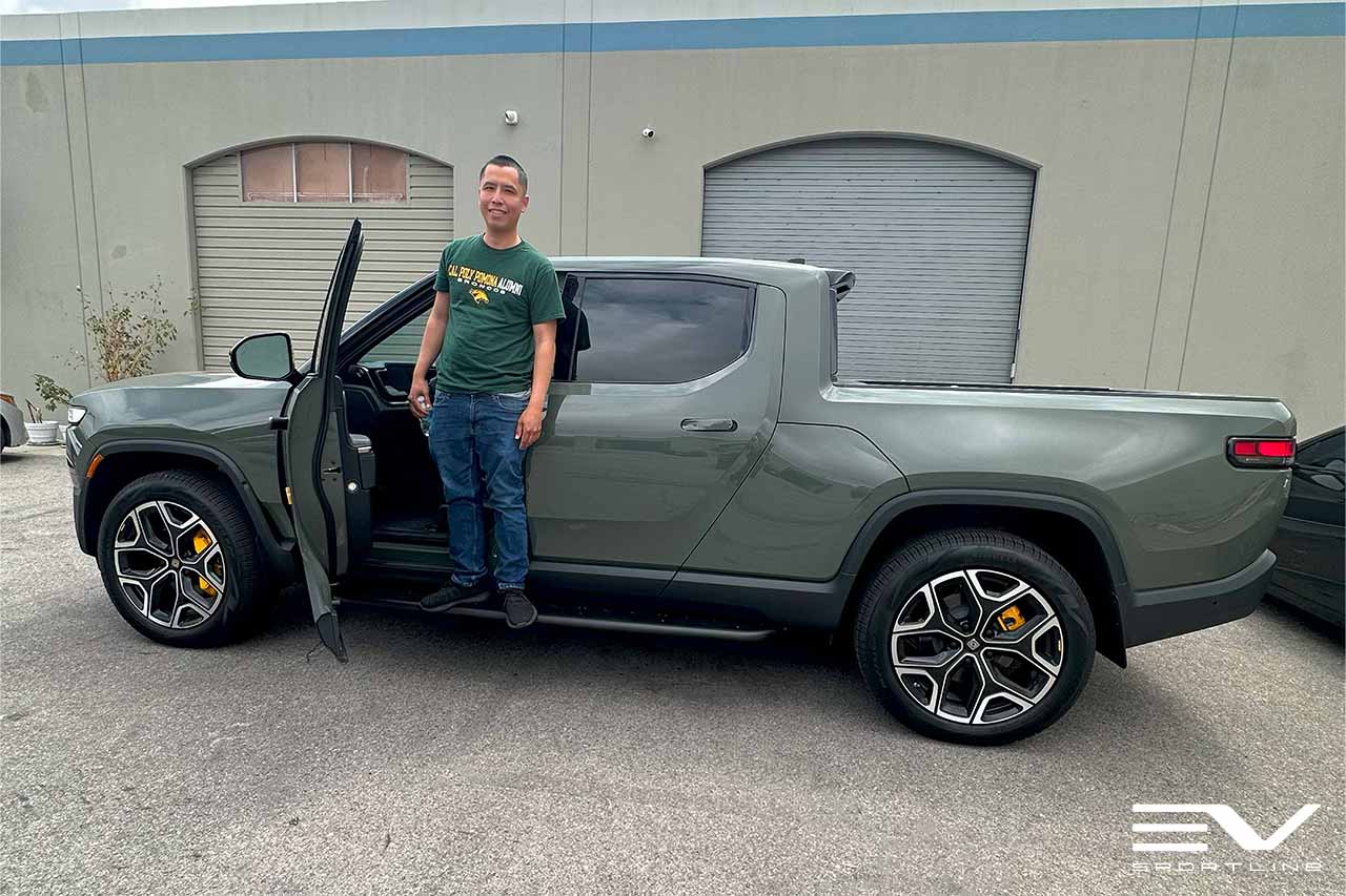 Launch Green Rivian R1T with Triple Slot Thread Running Boards