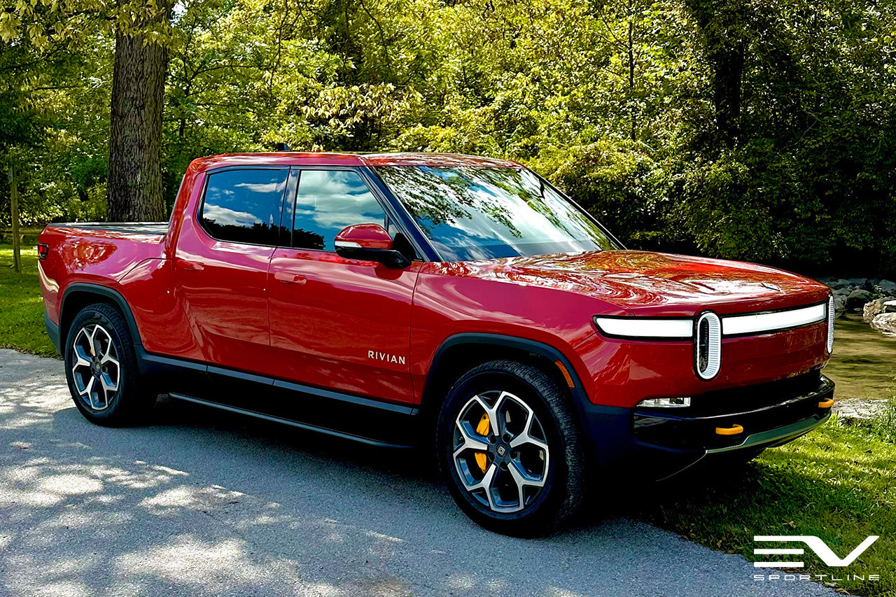Rivan Red Red Canyon Rivian R1T with Triple Slot Rock Sliders - EV Sportline ...