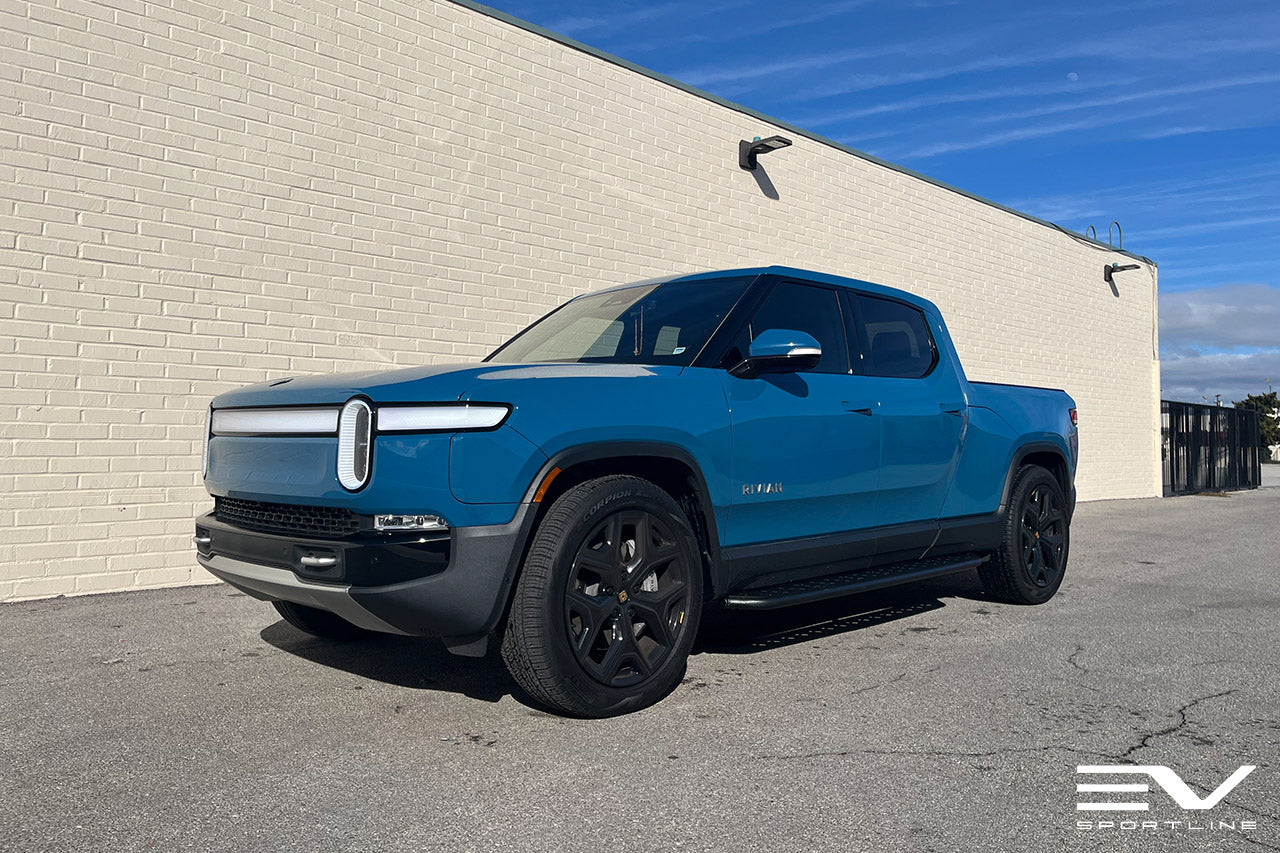 Rivian Blue Rivian R1T with Triple Slot Running Boards by Team 1EV