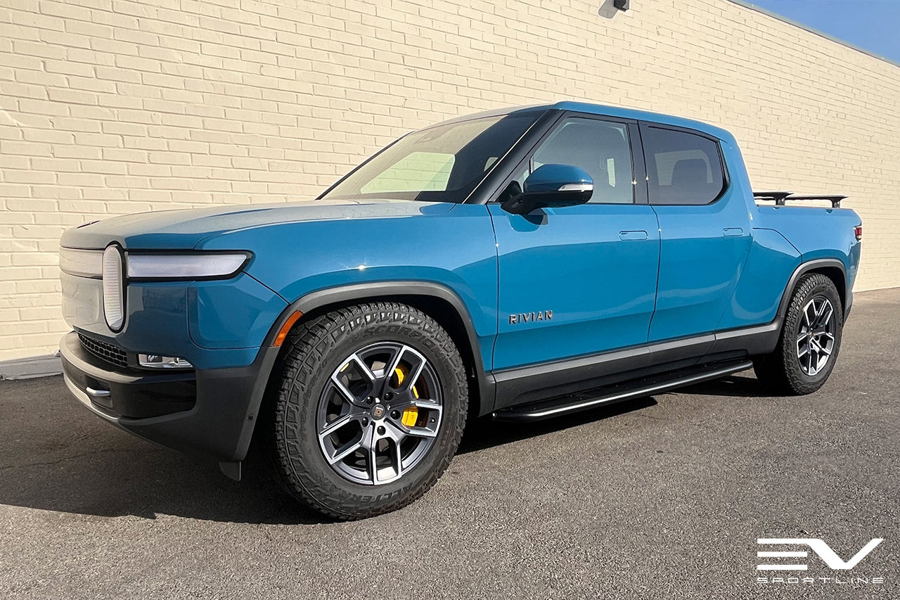 Rivian Blue Rivian R1T with Triple Square Running Boards