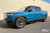 Rivian Blue Rivian R1T with Triple Square Running Boards