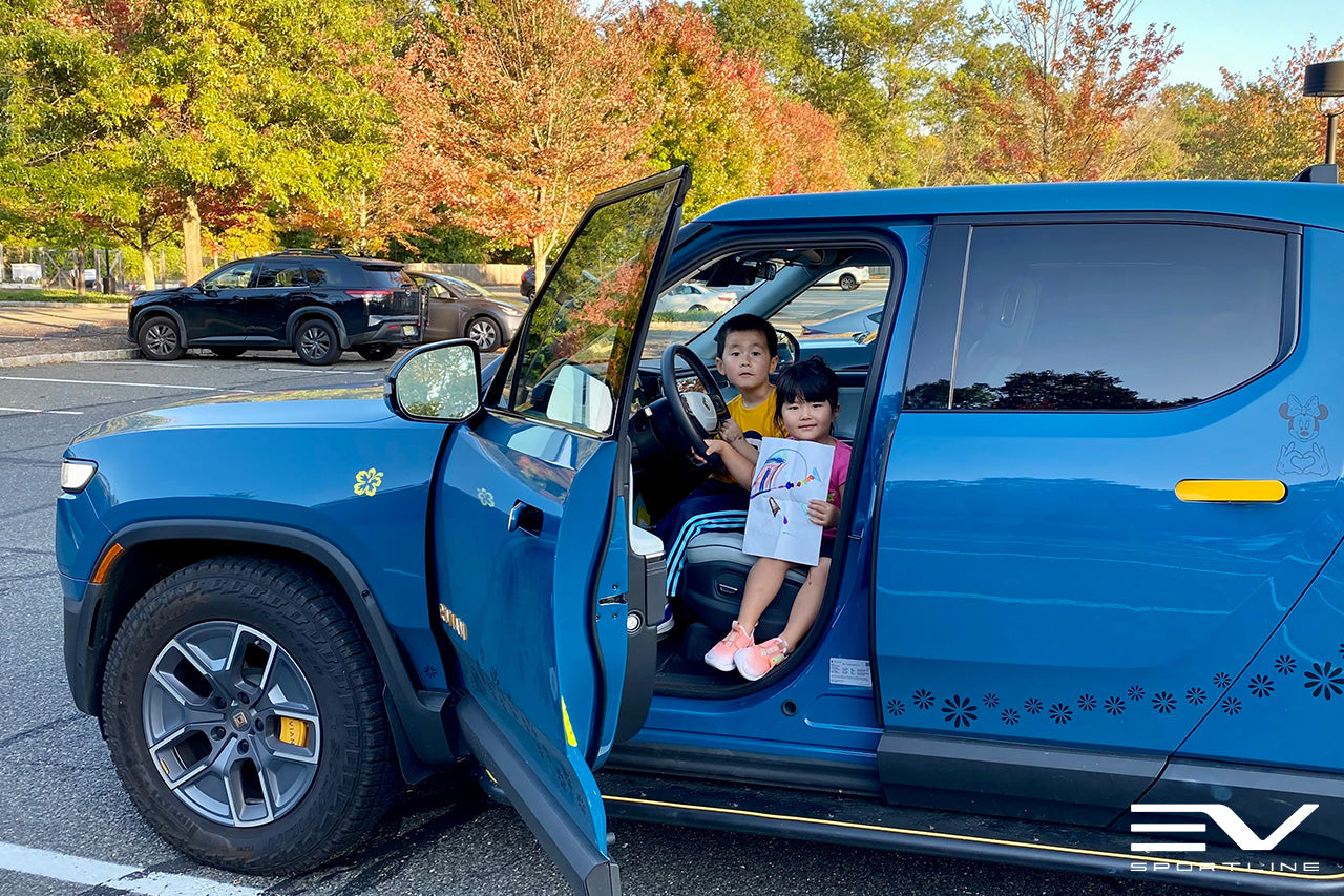 Rivian Blue Rivian R1T with Triple Square Rock Sliders