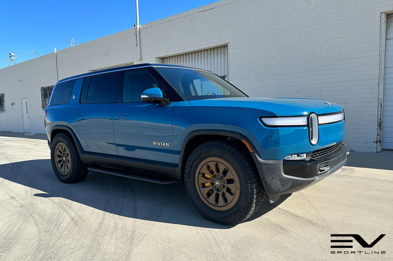 Rivian Blue Rivian R1S with Triple Square Running Boards