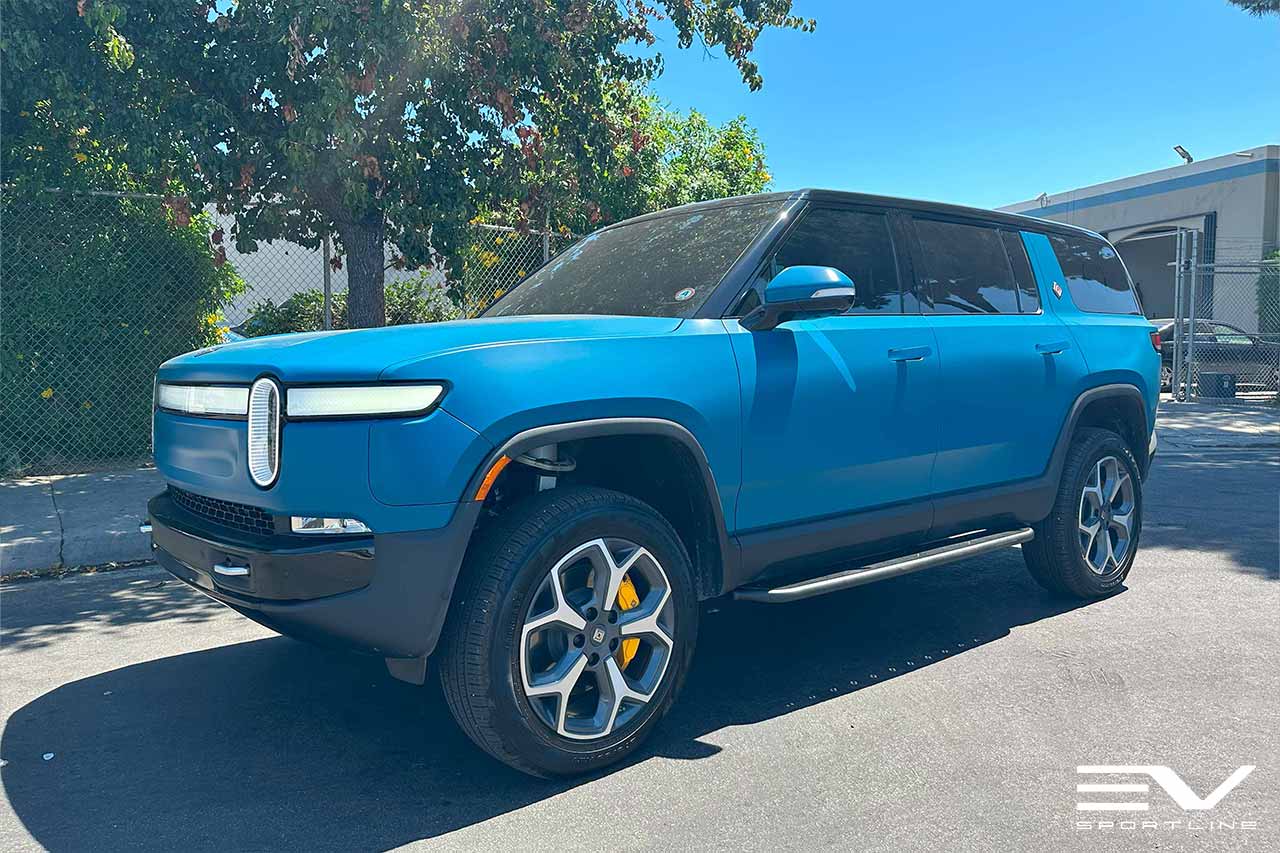 Rivian Blue Rivian R1S with Triple Square Thread Running Boards