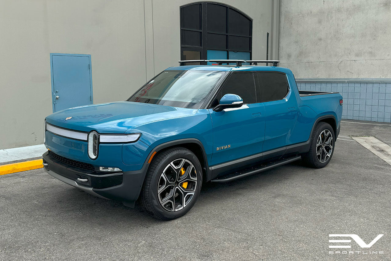 Rivian Blue Rivian R1T with Triple Running Boards