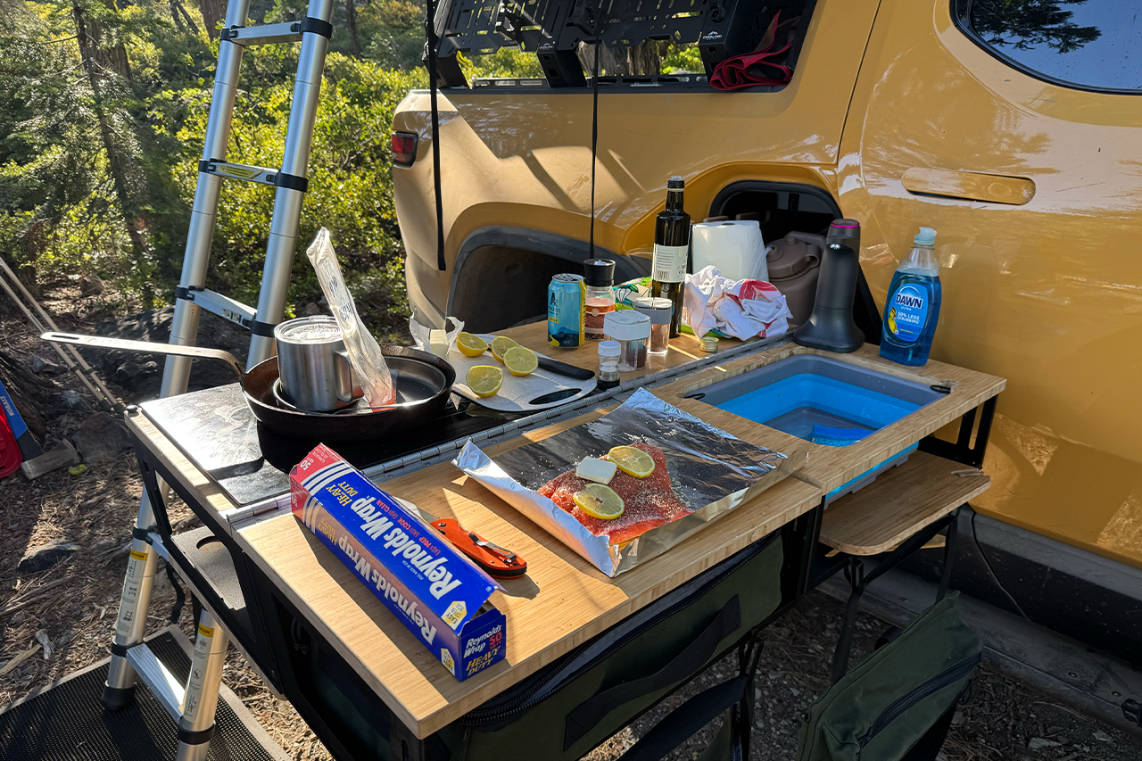 Overland Camp Kitchen with updated Gear Tunnel Sled for Rivian R1T by Thunderbolt Adventure