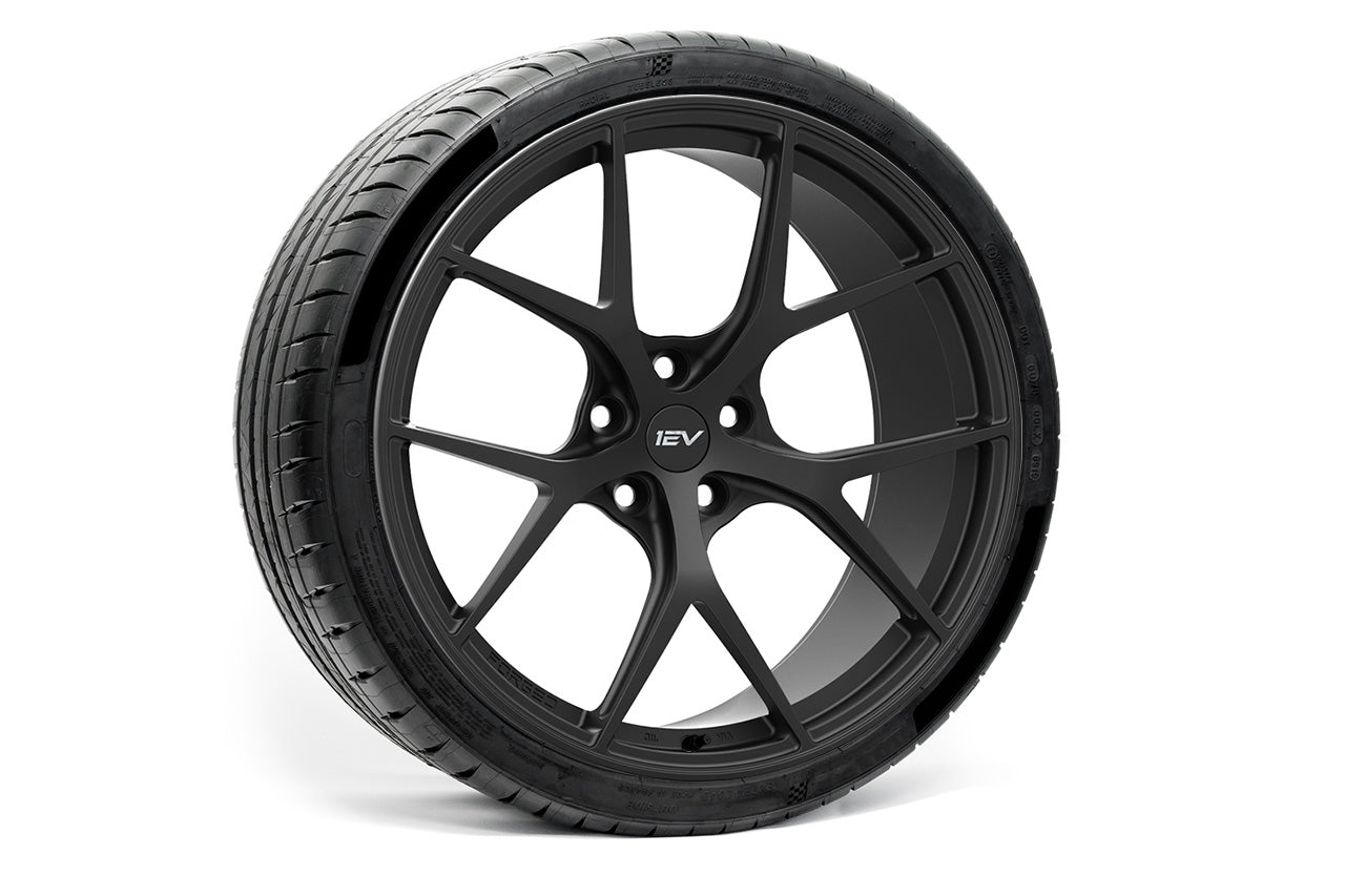 https://evsportline.com/cdn/shop/files/txl115-19-20-inch-team-1ev-aftermarket-wheel-and-tire-package-rendering-satin-black_1600x.jpg?v=1692906694